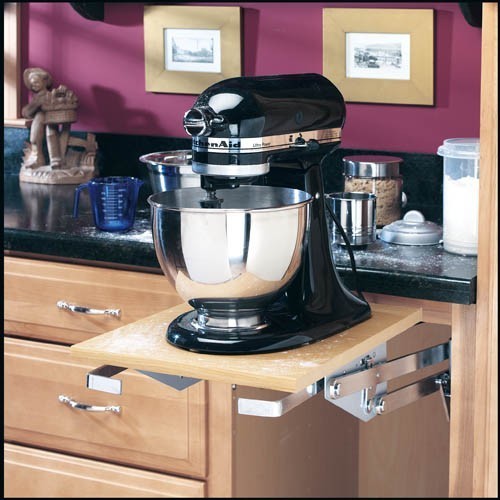 A mixer lift cabinet accessory can be helpful for extra work space in a craft room.