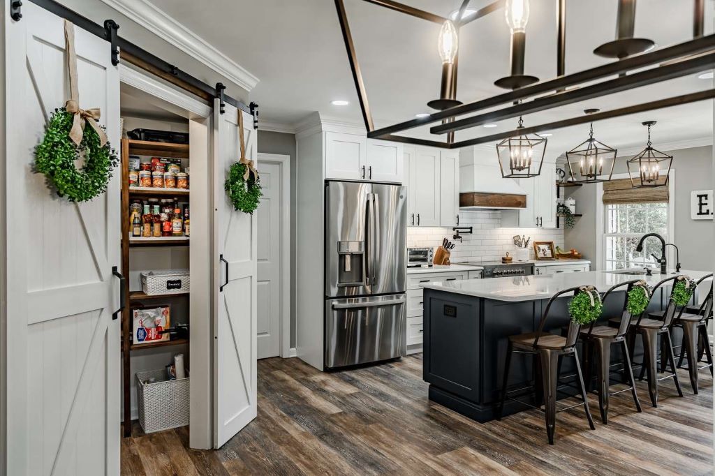 Warm wood tones to soften white cabinets