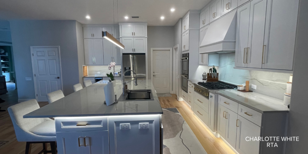 Full kitchen with under-cabinet lighting and toe-kick lighting, with Charlotte White cabinets